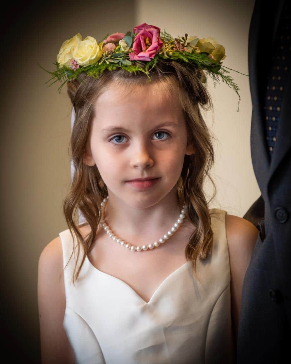 flower girl with pearls and wreath