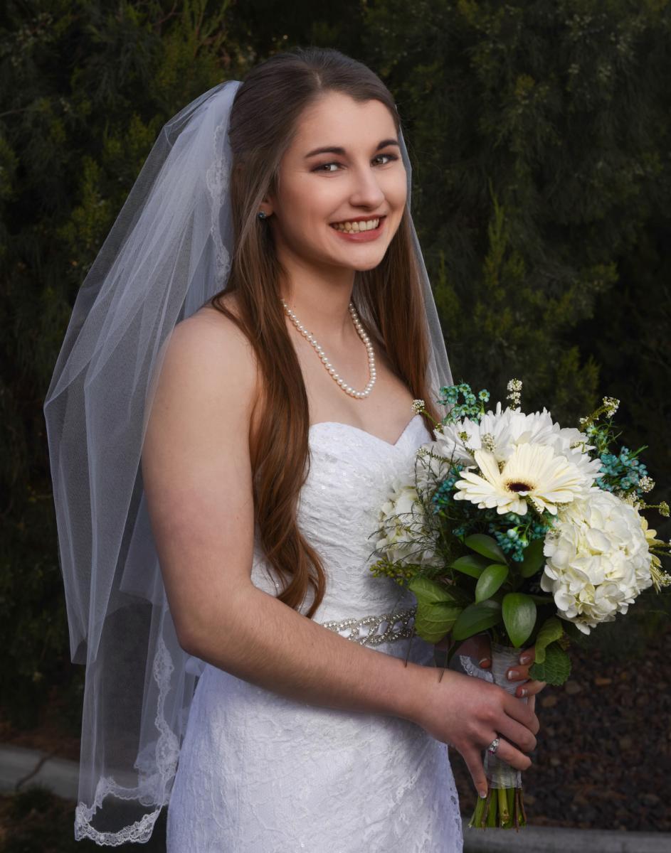 happy bride smiling at camera