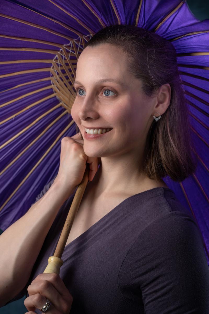 portrait of woman with purple parasol