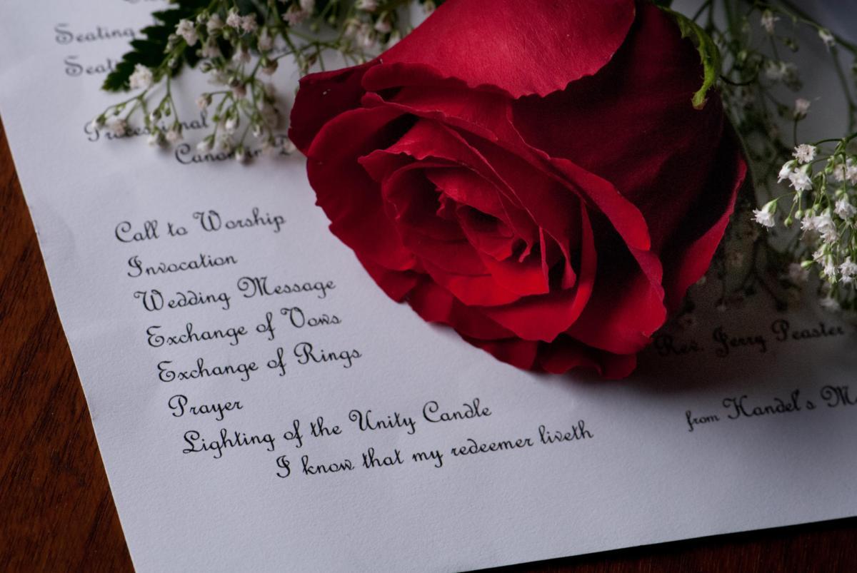 wedding program with rose