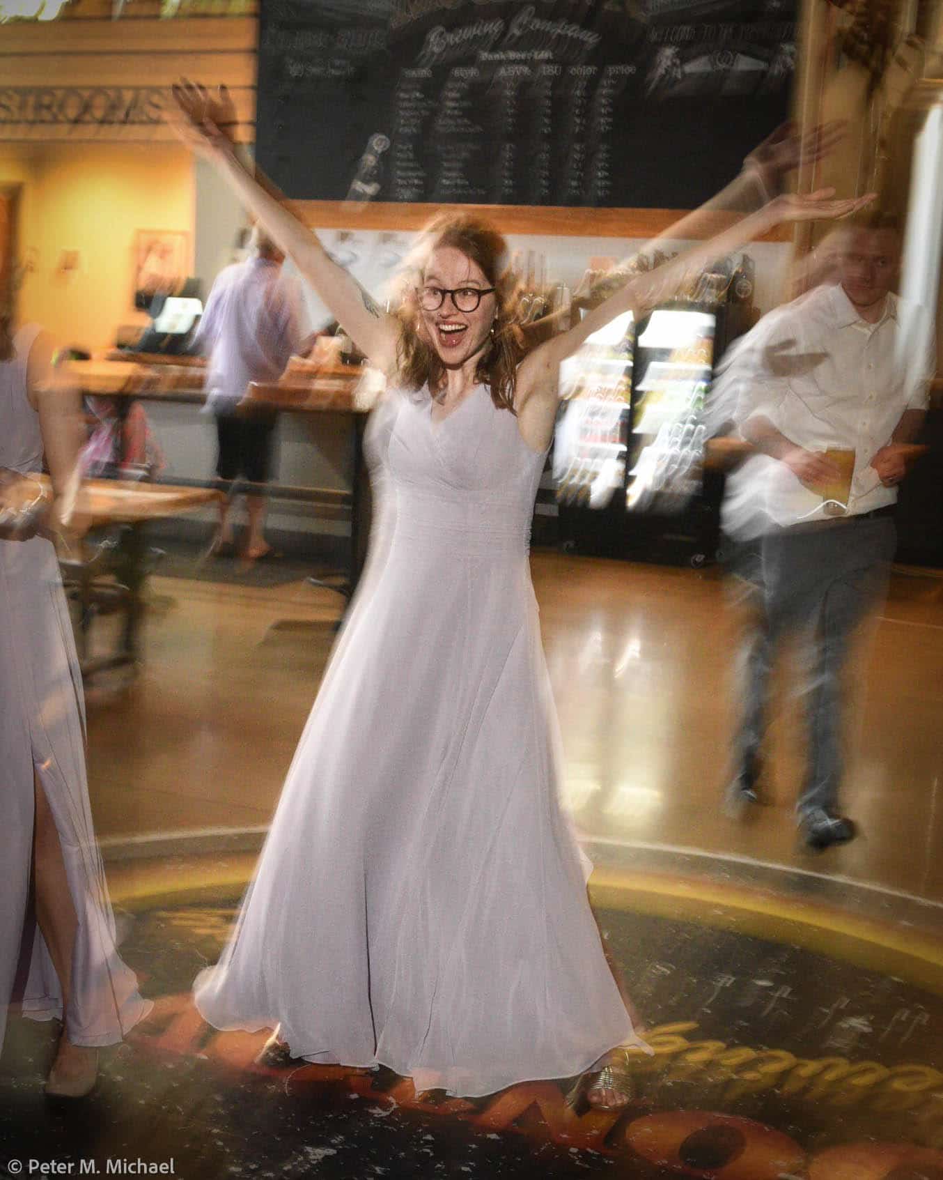 motion blur bridesmaid dancing reception