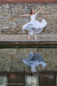 Ballet dancer with her reflection in the Indianapolis canal 