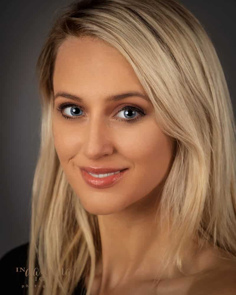 Glamor portrait of a young woman with blond hair