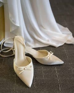 Bride's wedding shoes with dress